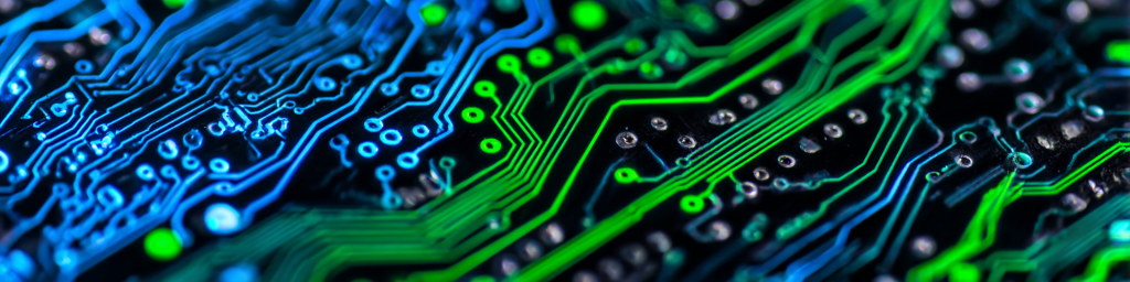 Circuit board with blue and green traces, electronic circuitry, tech hardware, semiconductor design