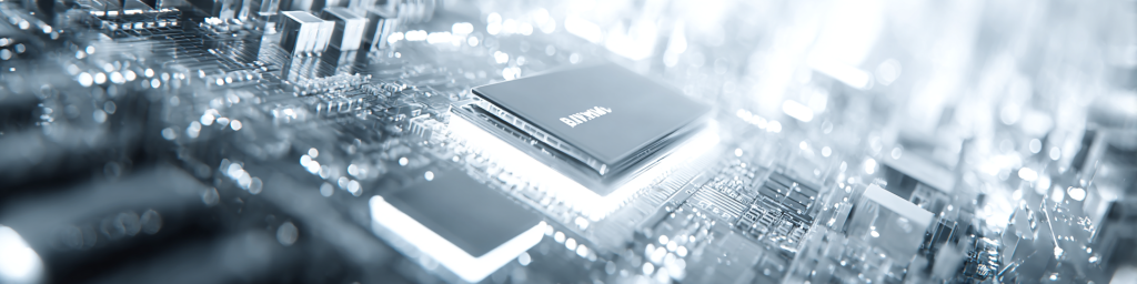 BHYKM-marked chip, silver-toned circuitry backdrop, soft tech glow, advanced semiconductor component, sleek electronic hardware graphic