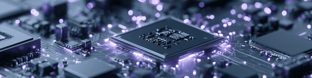 Panoramic close-up of a microprocessor with glowing purple light trails and bokeh on a motherboard, representing advanced computing, data processing, and high-tech semiconductor innovation.