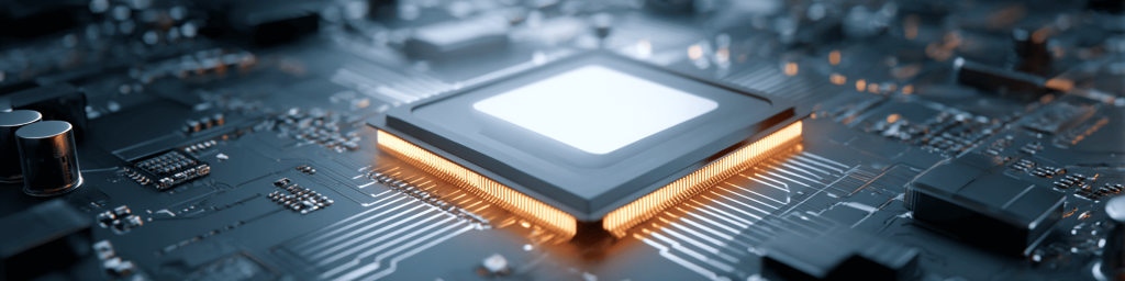 Panoramic close-up of a microprocessor with glowing orange connectors on a circuit board, representing advanced semiconductor technology and high-performance computing.