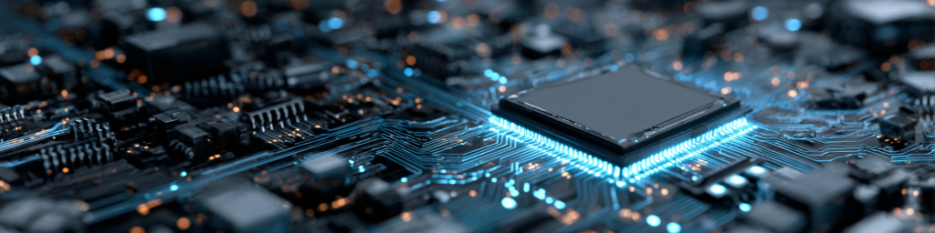 Panoramic close‑up of a microchip with glowing blue connectors on a circuit board, representing advanced semiconductor technology and high‑performance computing.