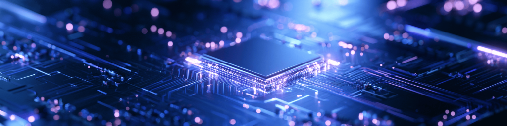 Panoramic tech banner of glowing semiconductor chip on dark circuit board with purple‑blue bokeh lights