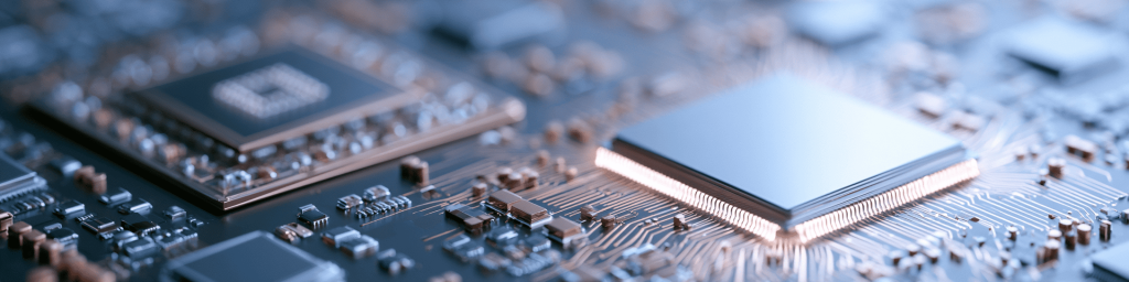 Panoramic banner of packaged semiconductor photonic IC chips arranged on detailed circuit motherboard