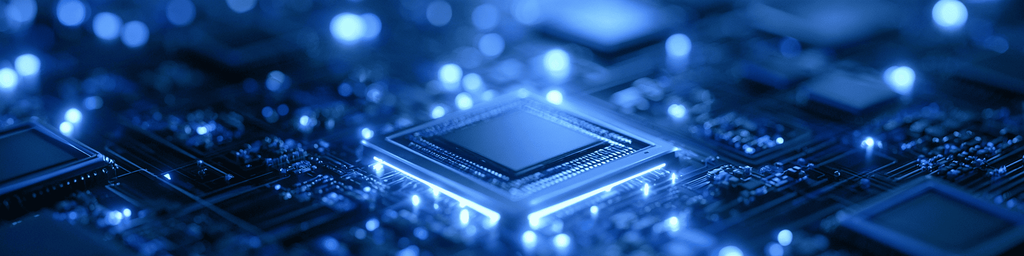 Wide banner view of glowing blue processor chip mounted on circuit board