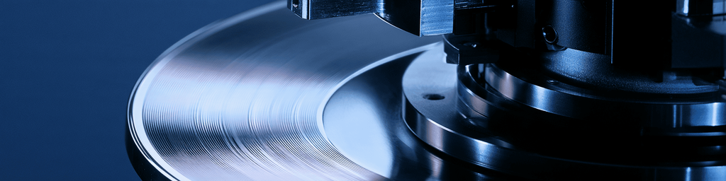 Close-up of rotating semiconductor wafer polishing machine disc